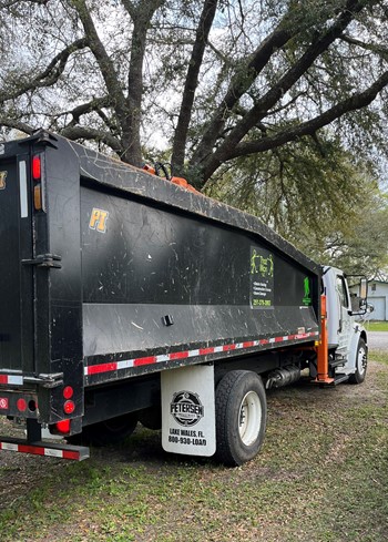 2021 Petersen TL3 Trash Truck Grapple Loader mounted on 2021 Freightliner M2 106 Chassis