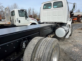 2005 Sterling LT9500 Truck, Crane and Grapple Saw Package